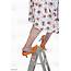 Orange Heeled Woman Slips Off Ladder Stock Photo  Download Image Now