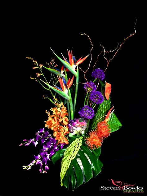 Tropical Floral Design Of Birds Of Paradise Alliums Protea Orchids And Woven Palm Fronds