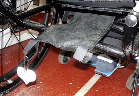 Catheter Storage Under Wheelchair Seat Spinalistips