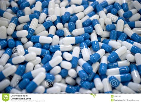 If your pill has no imprint it could be a vitamin, diet, herbal, or energy pill, or an illicit or foreign drug; White and blue capsules stock image. Image of medical ...