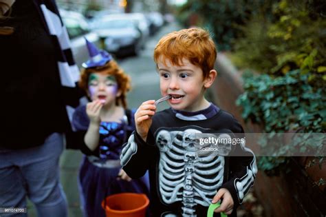 Eating Halloween Candy High Res Stock Photo Getty Images