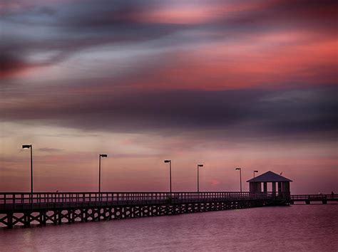 Biloxi Lighthouse Pier Sunrise Photograph By Derek Jones Fine Art America