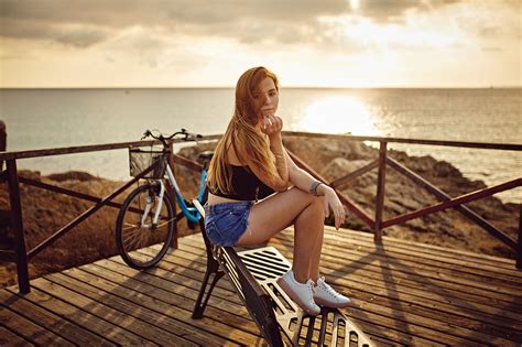 wallpaper blonde sea sunset sneakers bench jean shorts bicycle sitting women outdoors