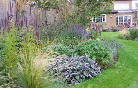 Grasses And Perennials In Surrey Cottage Garden Cottage Garden Cottage Garden Borders