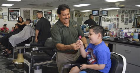 Barbershop celebrates 20 years of fresh cuts