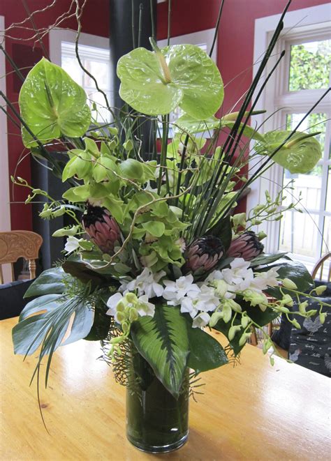 You can dye the acrylic water with liquid candle dye. Tropical Bouquet /suzanne douglas | Tropical arrangements ...