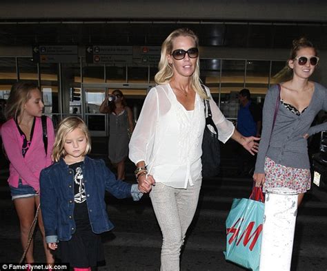 Jennie Garth Keeps Her Daughters By Her Side As They Touch Down In LA
