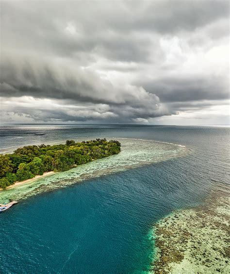 Aerial Photography Of Islands Under Cloudy Sky · Free Stock Photo