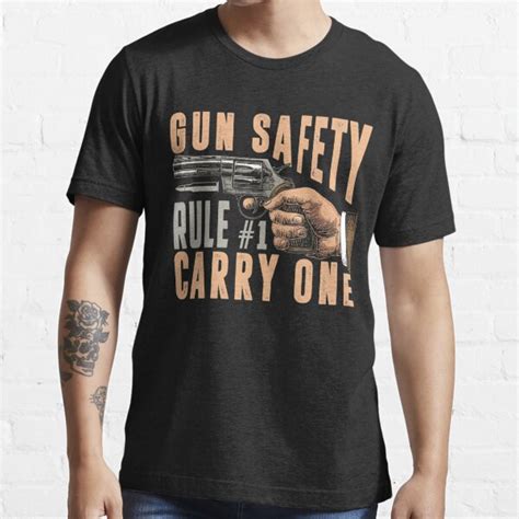 Gun Safety Rule 1 Carry One Shooting Clothing Gun T Shirt T Shirt For Sale By Leevinstee