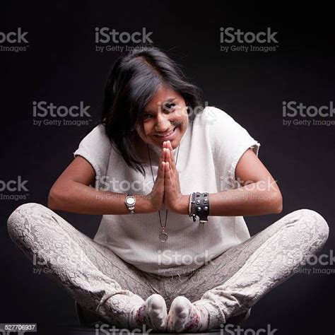 Indian Girl Saluting With A Namaste Stock Photo Download Image Now