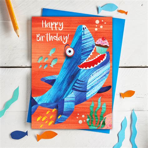 With a gift by the side. Shark Birthday Card By Rocket 68 | notonthehighstreet.com