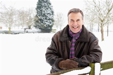 Senior Man Standing Outside In Snowy Landscape Stock Photo Image Of