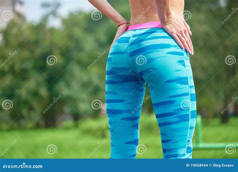 Close Up Photo Of Shapely Woman S Buttocks In Color Shorts Stock Photo