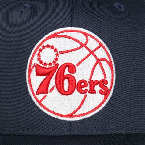 Free standard shipping on orders over $50. 110 Navy 76ers Cap by Mitchell & Ness - 37,95