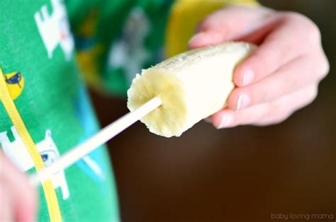 Yogurt Dipped Frozen Banana On A Stick With Toasted Coconut Finding Zest