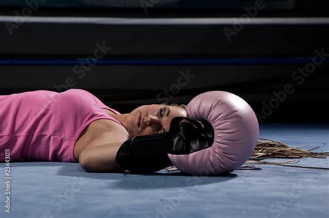Blonde Girl Lying Knocked Out In A Boxing Ring Stock Photo Adobe Stock