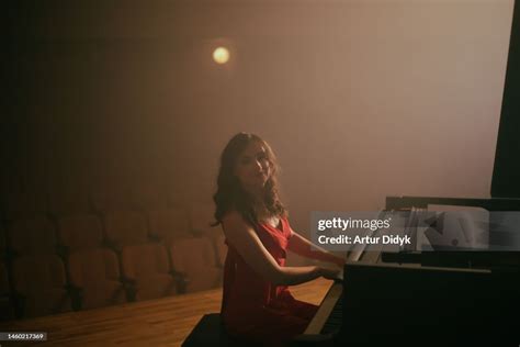 Woman Playing The Piano High Res Stock Photo Getty Images