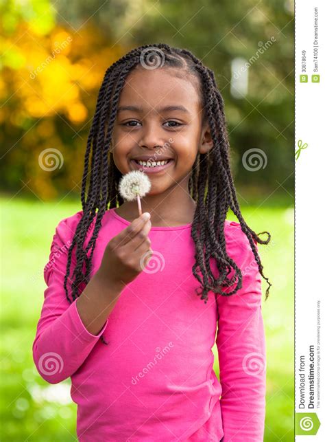 Outdoor Portrait Of A Cute Young Black Girl African