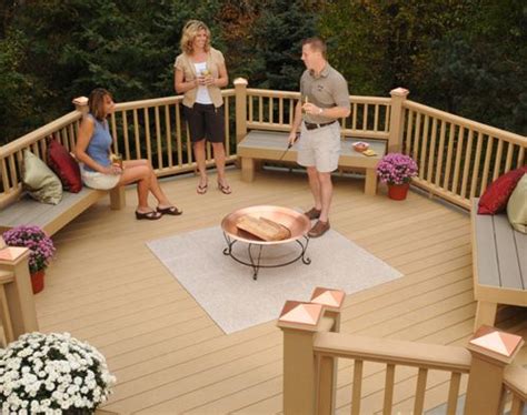 Can you put fire pit on wooden deck. Latitudes Intrepid composite decking and railing with deck ...