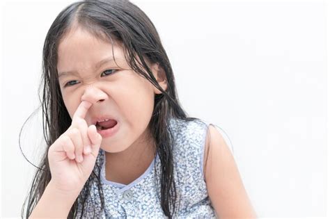 Premium Photo Little Cute Girl Pick Her Nose On White Background