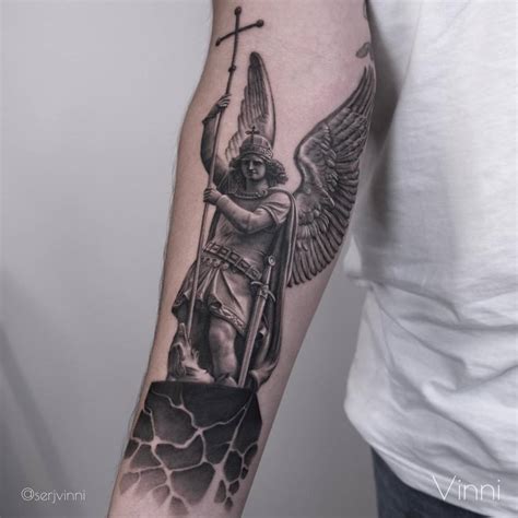 Archangel Michael Tattoo Located On The Inner Forearm