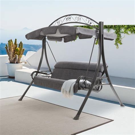 Corliving Patio Swing With Arched Canopy In Textured Grey In The Porch