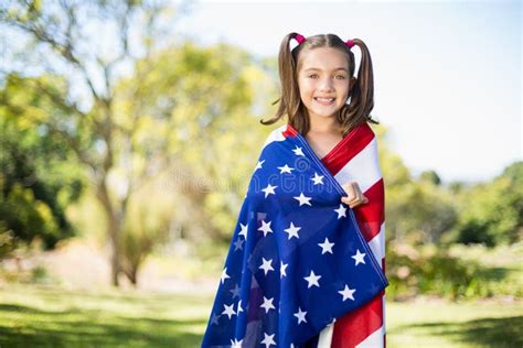Young Girl Wrapped In American Flag Stock Photo Image Of Happy