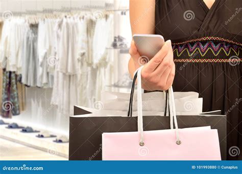 Woman Shopping Using The Smartphone Stock Photo Image Of Consulting