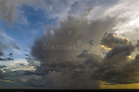 Cumulonimbus Clouds Forming Before Thunderstorm On Evening Sky