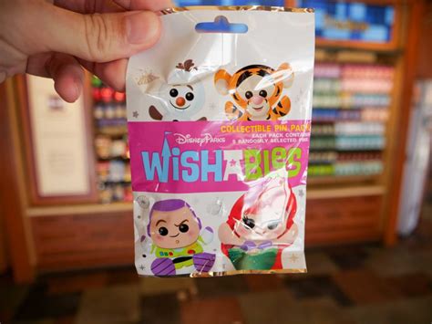 photos new wishables mystery pin set arrives at disney springs disney by mark