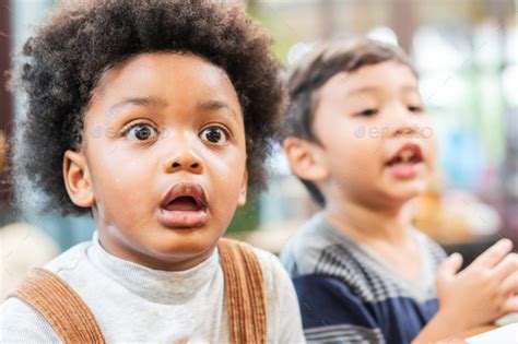 Black Kid Looking Surprise Stock Photo By Winnievinzence Photodune