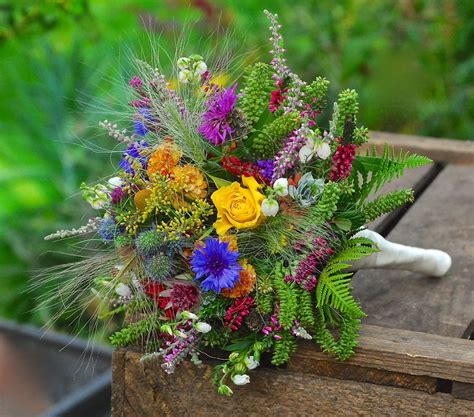Discover a range of seasonal floral designs and general floristry. This seasonal, organic posy for a nature-loving bride was ...