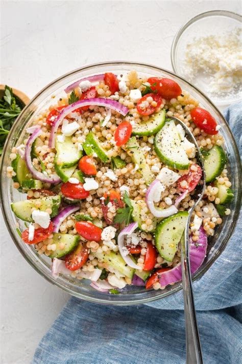 Pearl Couscous Salad With Tomato And Cucumber Nourish And Fete