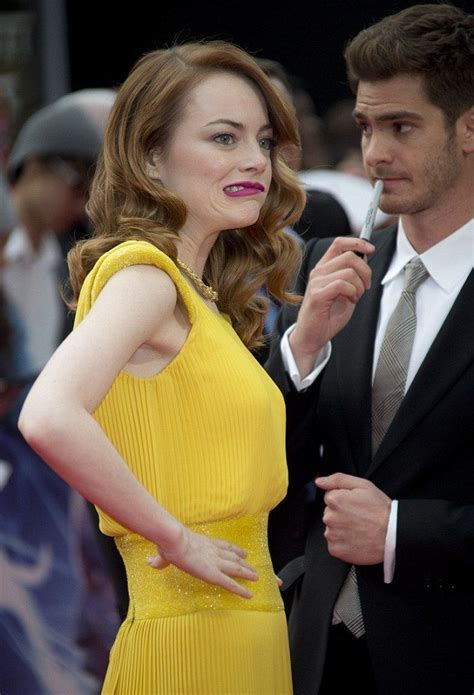 Parker hands stacy a vial and they kiss. Andrew Garfield and Emma Stone at the World Premiere of ...