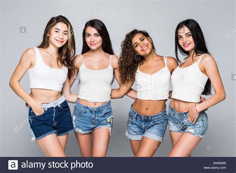 Group Of Beautiful Women Smiling Isolated Over A White Background Stock Photo Alamy