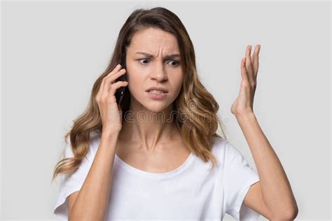 Annoyed Angry Woman Mad About Stuck Phone Isolated On Background Stock Image Image Of