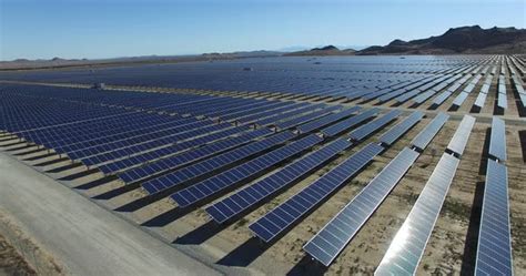 An Aerial Over A Solar Power Farm In The Mojave Desert Of California Stock Video Footage