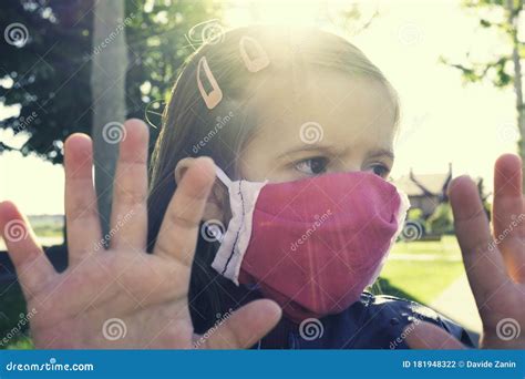 Little Caucasian Girl Wearing Medical Handmade Face Mask Protect For