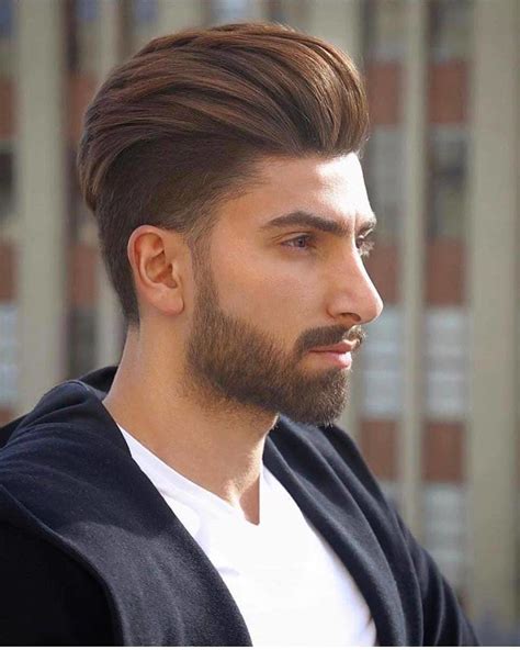 A messy part and hair that reaches down to the ears complete the look. 15 Cool Undercut Hairstyles for Men - Men's Hairstyles