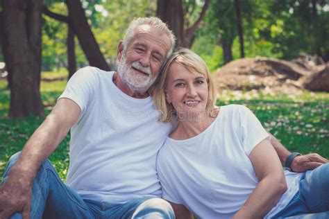 senior retirement older couple enjoy vacation in the park stock image image of couple