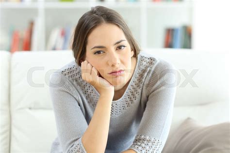 bored housewife looking at you at home stock image colourbox