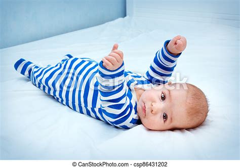 Cute Little Baby In Bed Happy Little Boy Lying In The Bed Funny Four