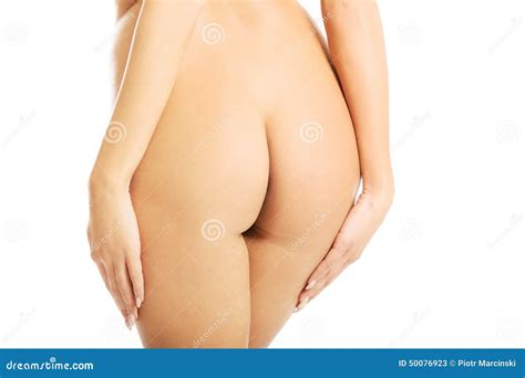 Vista Trasera De Las Nalgas De La Mujer Desnuda Imagen De Archivo