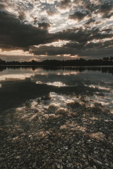Free Images Sunset Mirroring Lake Reflection Stones Clouds