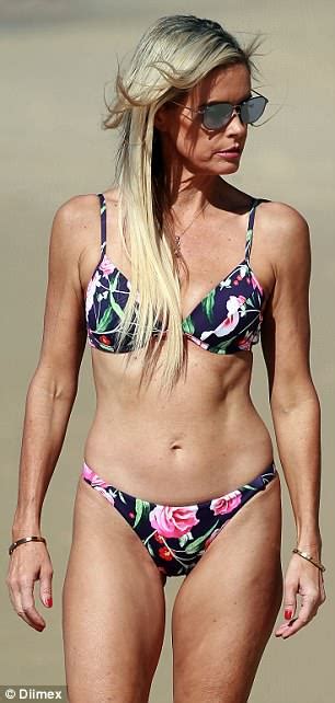 Former Neighbours Star Emma Harrison Strips Down To A Skimpy Bikini