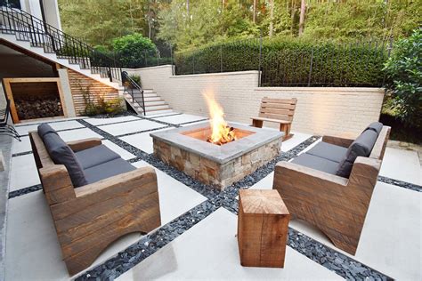 Concrete Squares And Slate Chips Patio With Custom Fire Pit