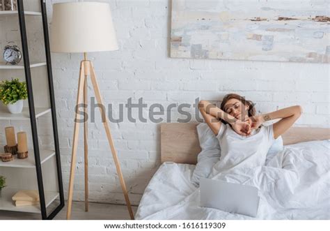 Dreamy Woman Chilling Bed Near Laptop Stock Photo Edit Now