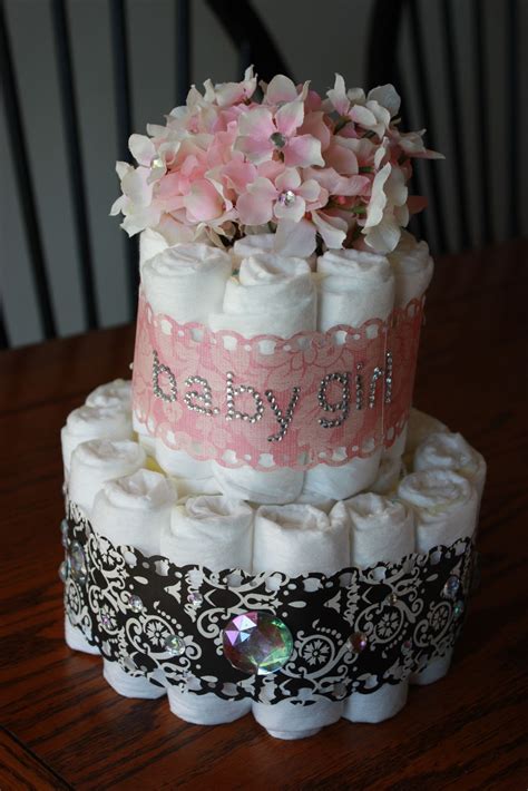 Unfold approximately 60 newborn or size one diapers, but. Our Blessed Life: Baby Shower - Diaper Cakes