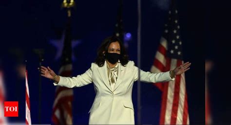 kamala harris wears suffragette white during first speech as us vice president elect times