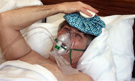 Man In Bed With Oxygen Mask Stock Image Image Of Holding Male